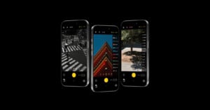Three smartphones are displayed against a black background, each showing a different photo editing mode: black and white street scene, color photo of a red-roofed building, and a street scene with editing options on the screen.