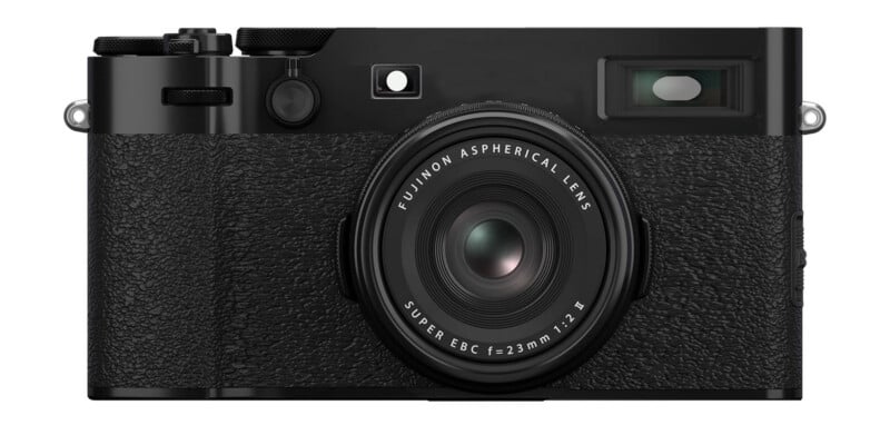 Front view of a black Fujifilm digital camera with a textured grip, featuring a Fujinon aspherical lens marked "23mm 1:2" and a rectangular optical viewfinder on the upper right.