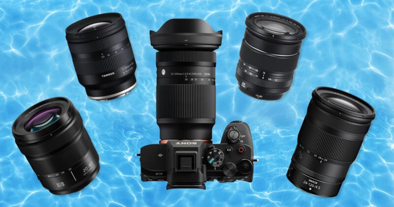 A Sony camera with five interchangeable camera lenses is arranged in a star shape over a bright blue water background.