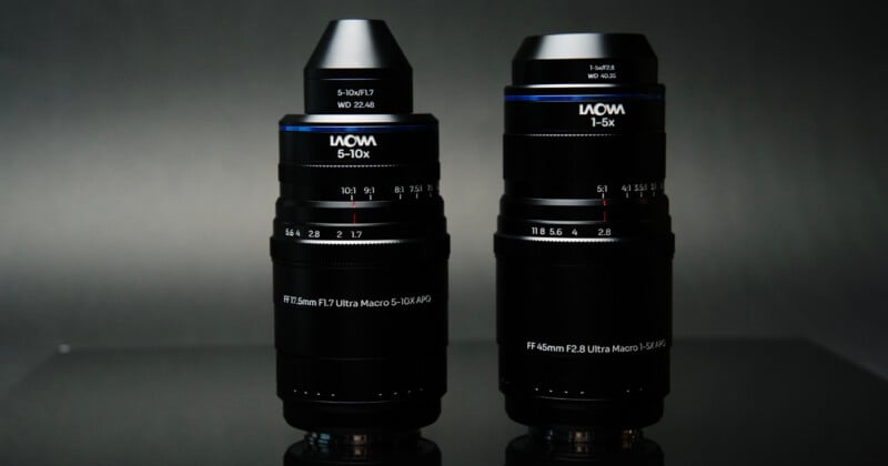 Two Laowa macro lenses stand side-by-side against a dark grey background, with the left lens labeled 5-10x and the right lens labeled 1-5x.