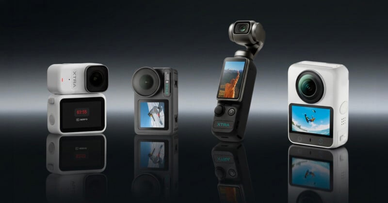 Four compact action cameras stand upright on a reflective surface, each with a display screen showing outdoor scenes. The background is dark and gradient.