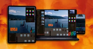 A tablet, laptop, and smartphone display the same photo editing software with color grading tools and an image of a person on a dock by a lake, set against an orange, smoky background.