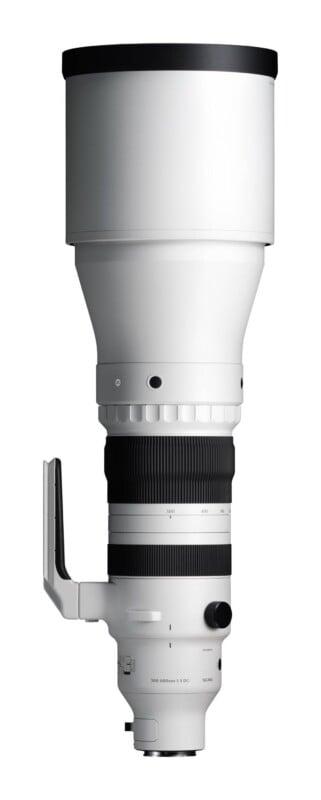 A white Sigma 300-600mm f/4 DG telephoto zoom lens standing vertically against a white background.