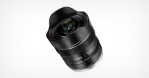 A 7Artisans 10mm f/2.5 fisheye lens for Sony E-mount cameras, shown at an angle against a white background.