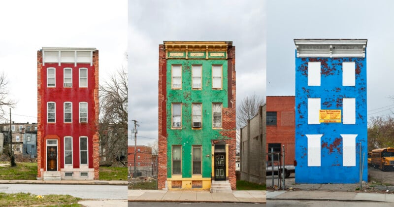 Three narrow, multi-story row houses painted bright red, green, and blue stand side-by-side, with the blue house featuring boarded-up windows and a tax preparation sign.