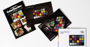 Four X-Rite ColorChecker Classic packaging boxes are arranged on a white surface.