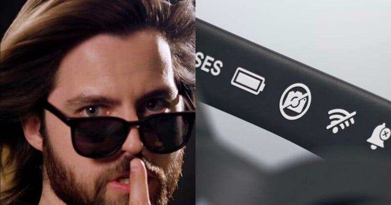 A man with long hair and a beard holds a finger to his lips while wearing sunglasses, shown next to a close-up of a device arm displaying battery, camera, Wi-Fi, and notification icons.