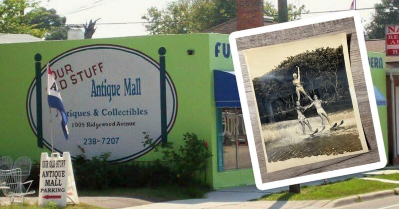 A lime green building with a sign for "Our Old Stuff Antique Mall" at 1005 Ridgewood Avenue, featuring an inset vintage photograph of three people water skiing.