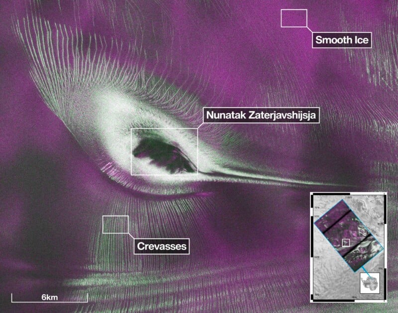 A satellite radar image shows the dark, rocky Nunatak Zaterjavshijsja surrounded by flowing ice, marked by radiating crevasses.