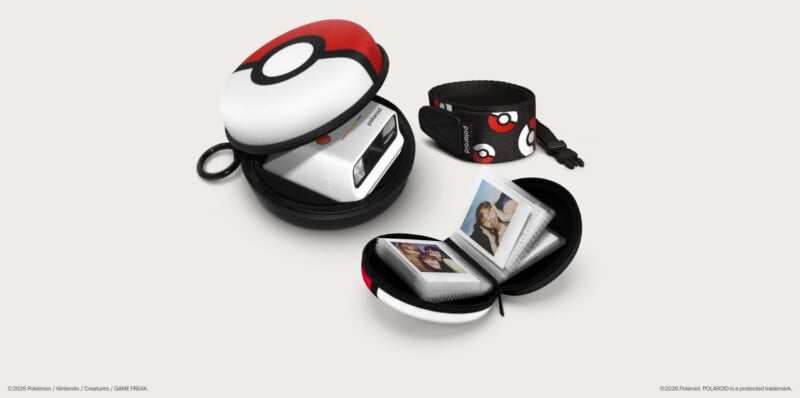 A Poké Ball-themed Polaroid camera case containing a white camera, a matching Poké Ball-patterned camera strap, and a small photo album filled with instant photos.