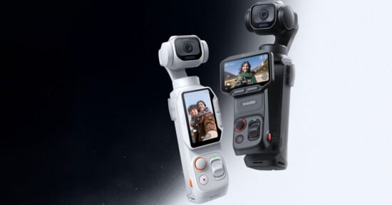 Two handheld gimbal cameras, one white and one black, are positioned against a split black and white background.