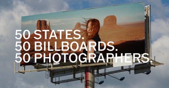 A large outdoor billboard against a cloudy sky features a woman with windblown hair standing in front of a desert landscape, with the text "50 STATES. 50 BILLBOARDS. 50 PHOTOGRAPHERS." overlaid.