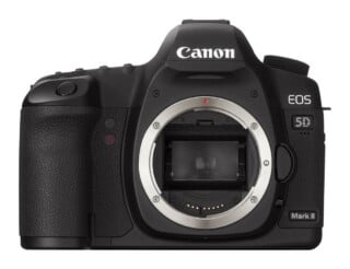 Front view of a black Canon EOS 5D Mark II DSLR camera body without a lens attached.