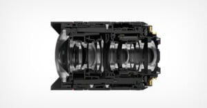 A cross-section view of a camera lens showing its internal glass elements and mechanical housing.