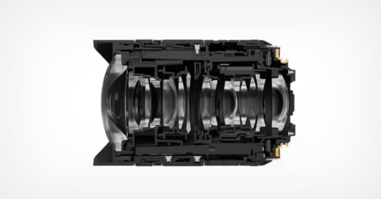 A cross-section view of a camera lens showing its internal glass elements and mechanical housing.
