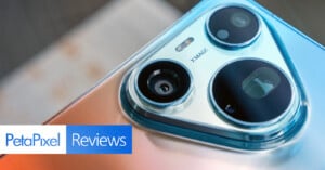 A close-up view of a smartphone camera module with three lenses and the text "XMAGE" printed on the metallic housing, with a "PetaPixel Reviews" logo in the bottom left corner.