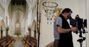 A split-screen view showing the interior of a Gothic-style church on the left and a photographer using a large-format camera on the right.