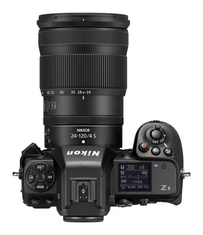 Top-down view of a Nikon Z8 mirrorless camera with a Nikkor Z 24-120mm f/4 S lens attached, showing the top LCD display and control buttons.
