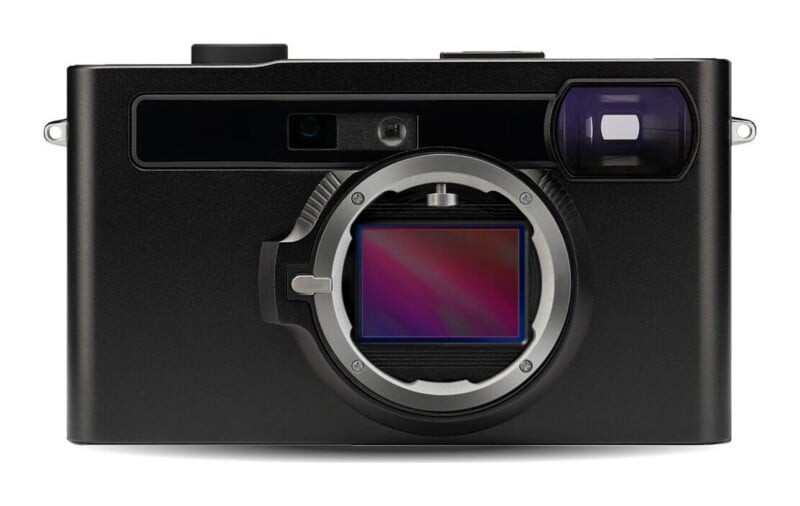 A front view of a black digital camera body with an exposed rectangular image sensor inside the lens mount.