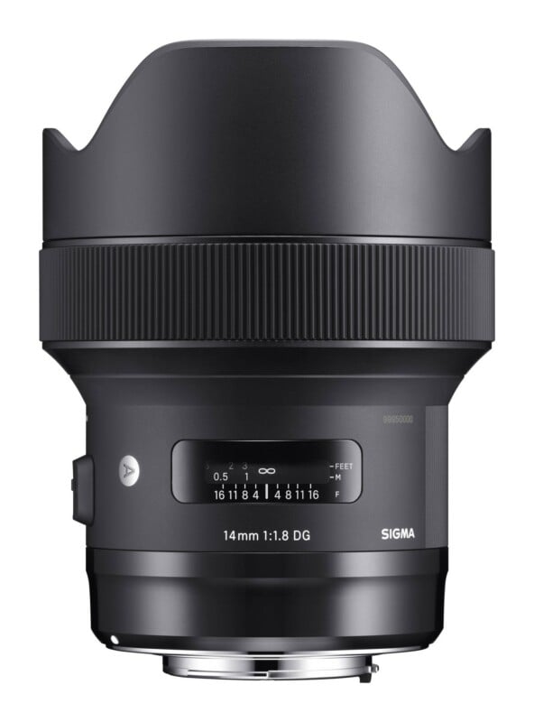 A black Sigma 14mm 1:1.8 DG camera lens with a focus distance scale and aperture markings on its barrel.