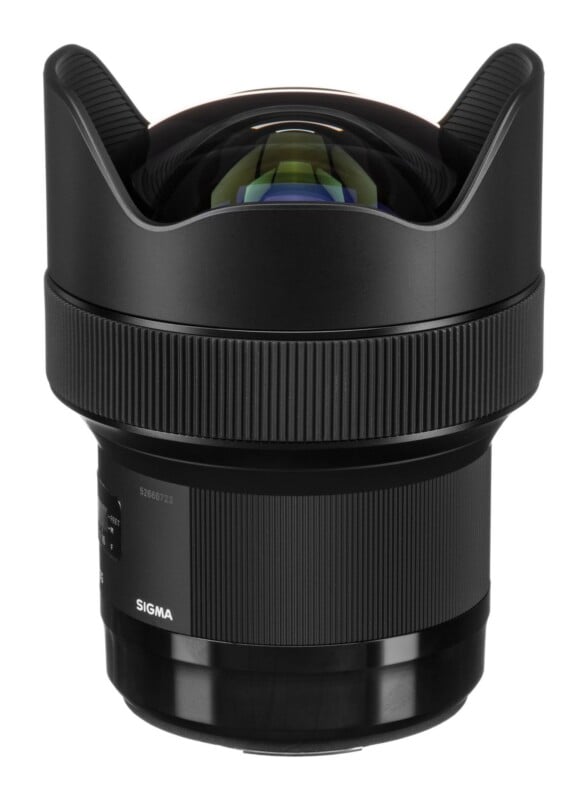 A black Sigma fisheye camera lens with a prominent, bulbous front element and integrated petal-shaped lens hood.