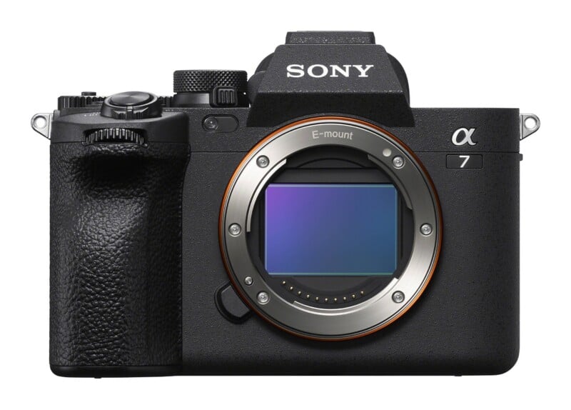 A front view of a black Sony Alpha 7 mirrorless camera body with an E-mount lens opening and visible sensor.