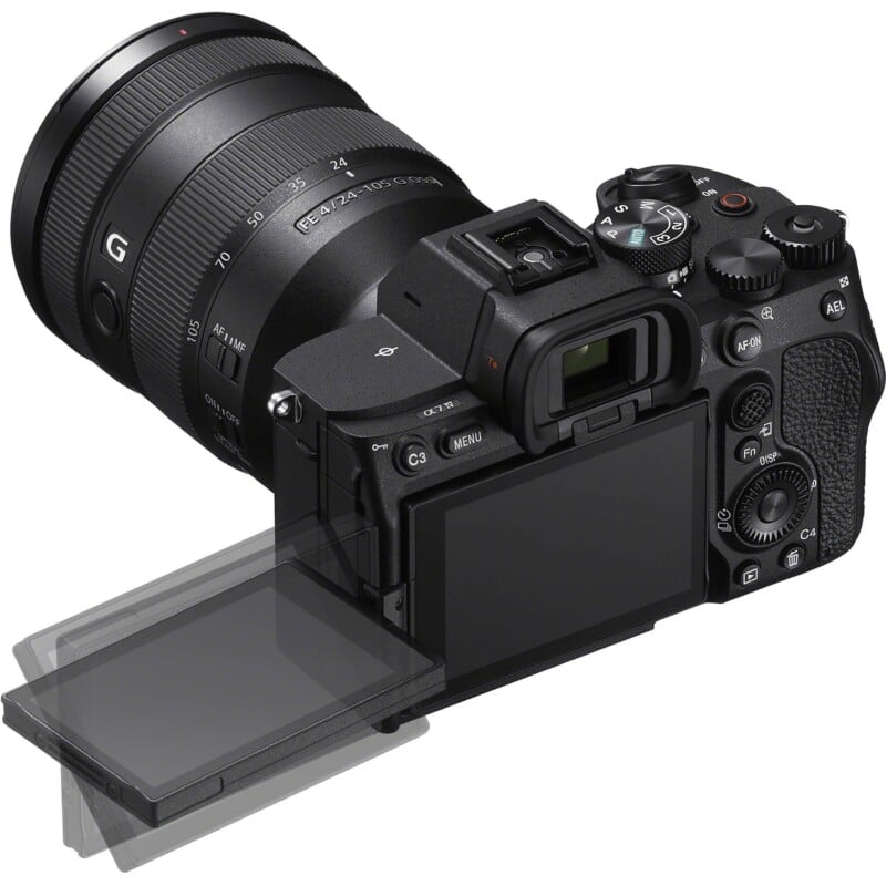 A black mirrorless camera with a zoom lens attached, featuring a vari-angle LCD screen extended to the side.