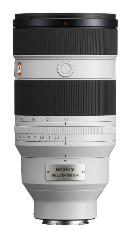 A white Sony FE 2/50-150 GM camera lens stands vertically against a plain white background.