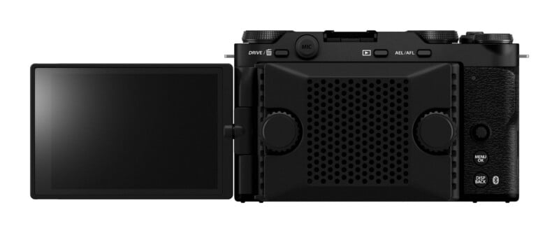 A black digital camera viewed from the back, featuring a side-hinged flip-out screen, a perforated cooling fan attachment on the rear, and various control buttons labeled with text like "DRIVE," "MIC," "AEL/AFL," "MENU OK," and "DISP BACK.