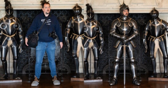 A split-screen image showing a man in casual clothing standing between two suits of armor on the left, and the same man wearing one of the suits of armor on the right.