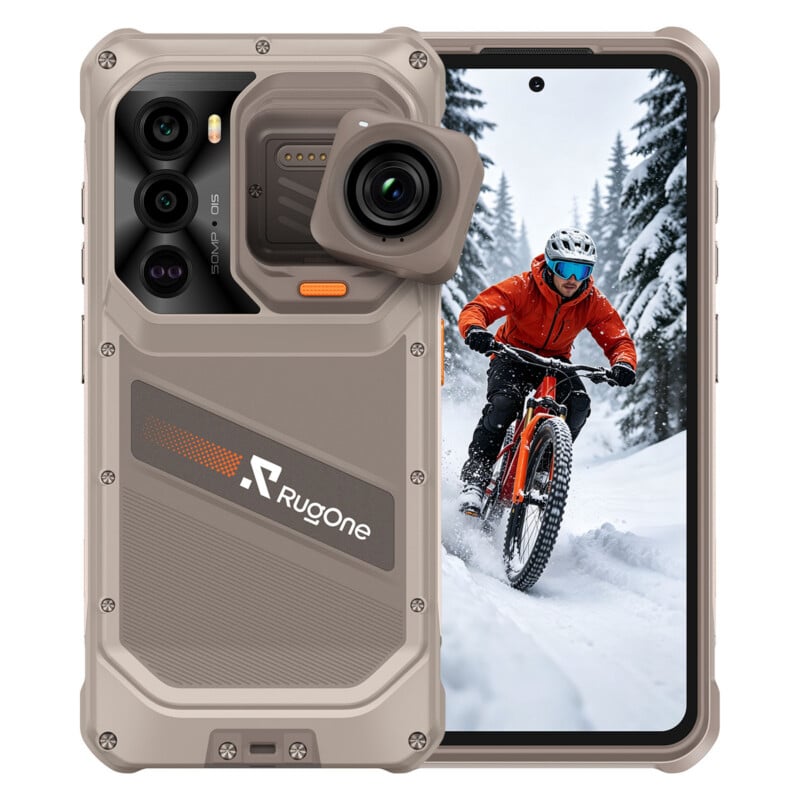 A rugged, tan-colored smartphone shown from the back and front, featuring a modular camera lens attachment, a triple-camera array, and a screen displaying a person mountain biking in the snow.