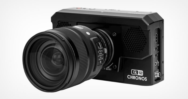 A black Chronos Q12 high-speed camera with a mounted Sigma lens, viewed from a front-side angle against a white background.
