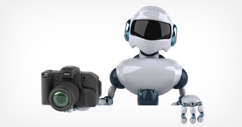 A white and dark blue robot holds a black camera in its right hand against a plain white background.