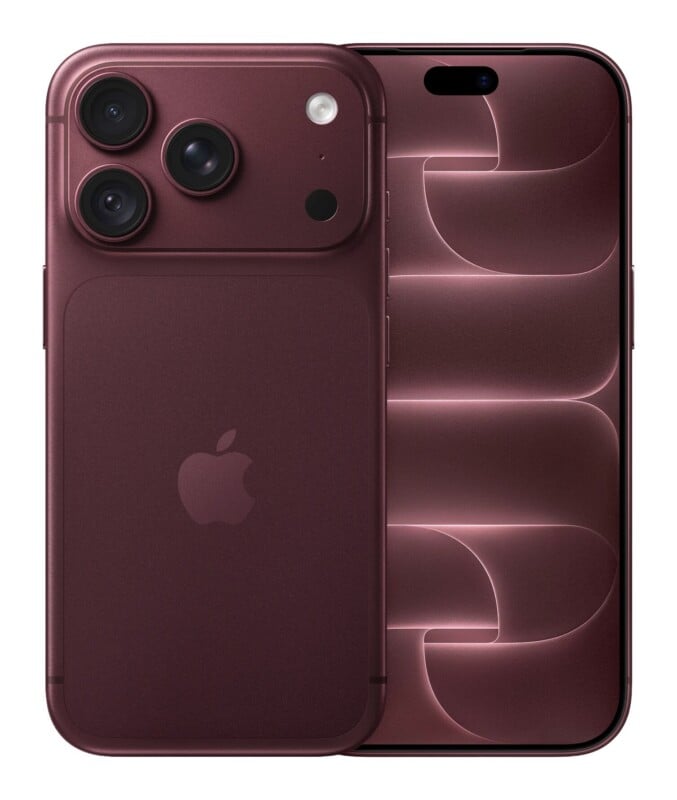 A dark red smartphone shown from the back and front, featuring a triple-lens camera array and a pill-shaped display cutout.