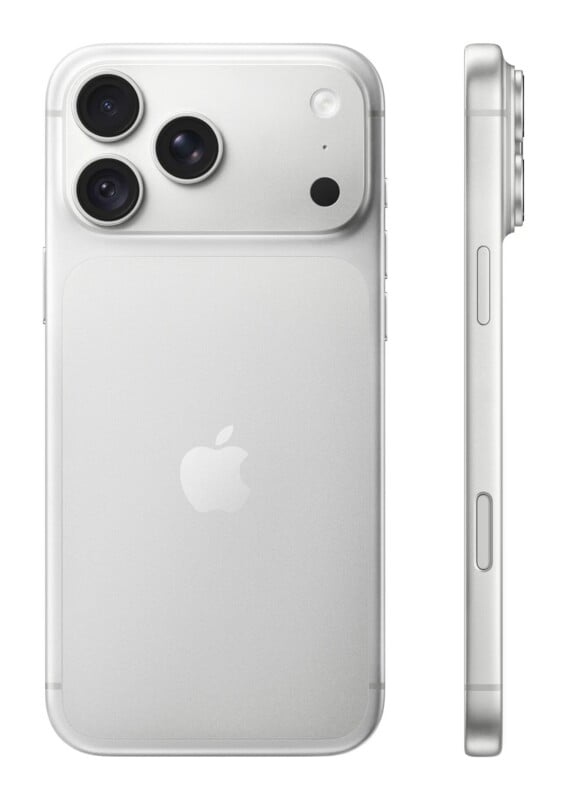 A silver smartphone shown from the back and side, featuring a triple-lens camera array, a flash, and an Apple logo on the rear.