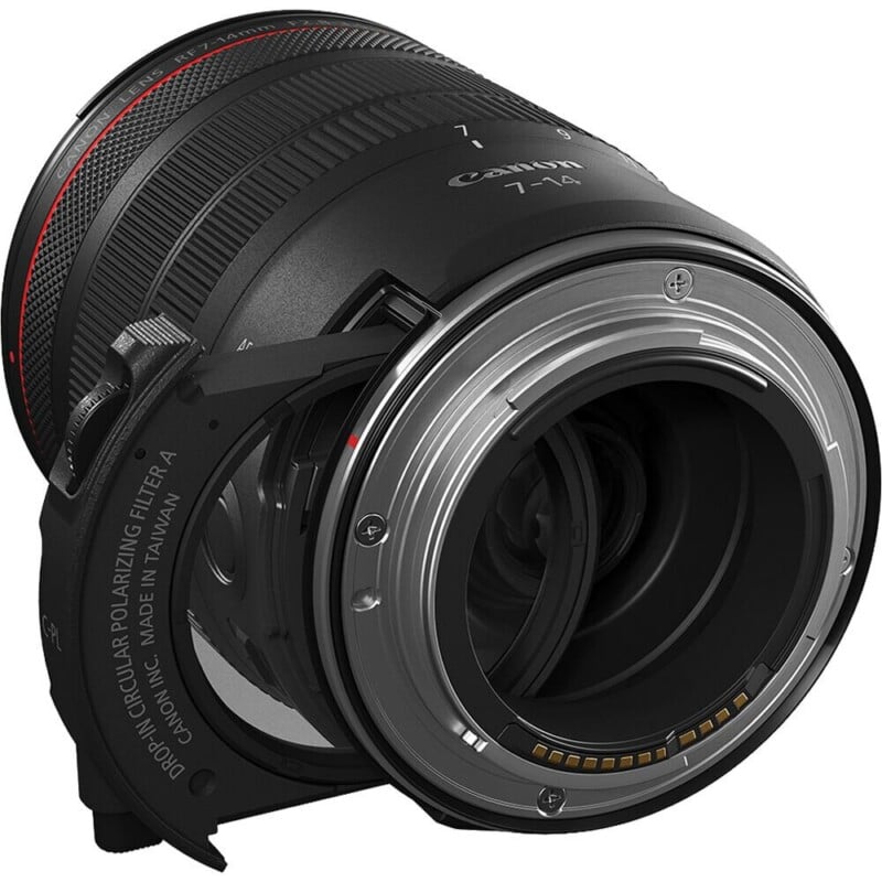 A Canon RF 7-14mm lens shown from the rear, featuring a drop-in circular polarizing filter inserted into the mount area.