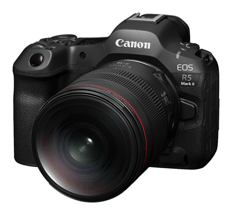 A black Canon EOS R5 Mark II mirrorless camera with a wide-angle lens attached, shown against a white background.