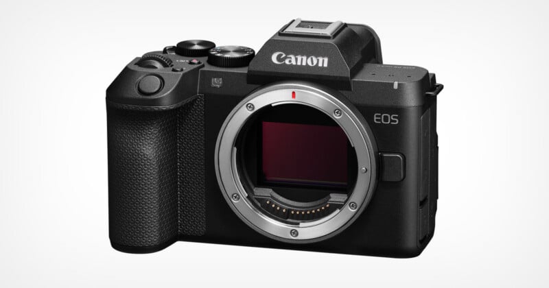 কালো Canon EOS R8 Mark II মিররলেস ক্যামেরা বডির সামনের দৃশ্য। এটিতে একটি লেন্স মাউন্ট, টেক্সচার্ড গ্রিপ এবং উপরে একটি মোড ডায়াল রয়েছে।