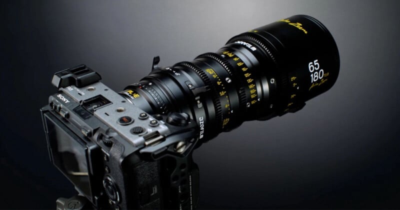 A Sony FX3 cinema camera is mounted with a DZOFilm Arles Zoom 65-180mm T2.8 lens against a dark gray background.
