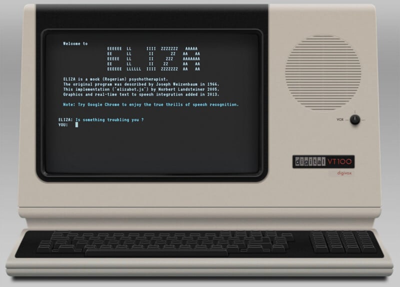A vintage-style computer terminal displays the ELIZA chatbot program on its screen, with a keyboard positioned below.