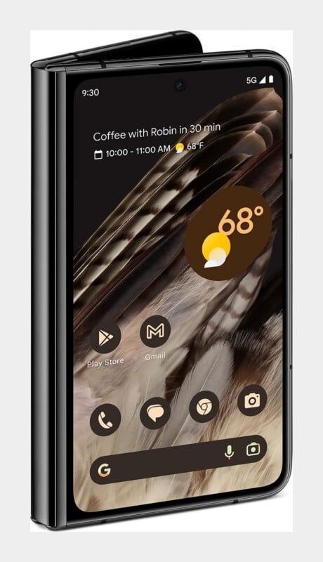 A black foldable smartphone shown at an angle, displaying a home screen with a calendar event, weather widget, and app icons.