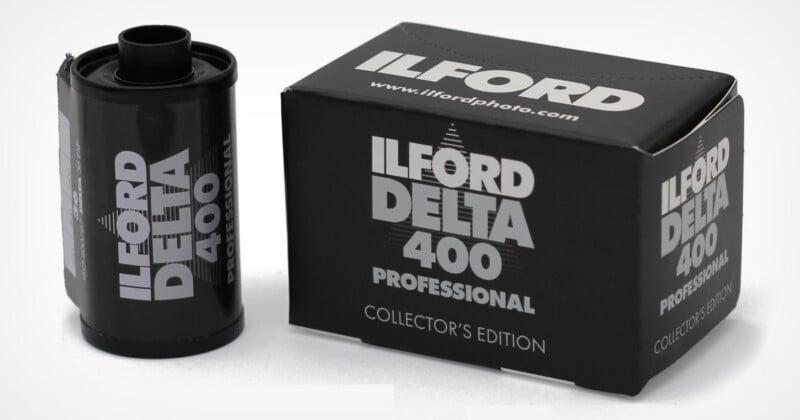 A 35mm film canister and its matching box, both labeled Ilford Delta 400 Professional Collector's Edition, sit on a white surface.