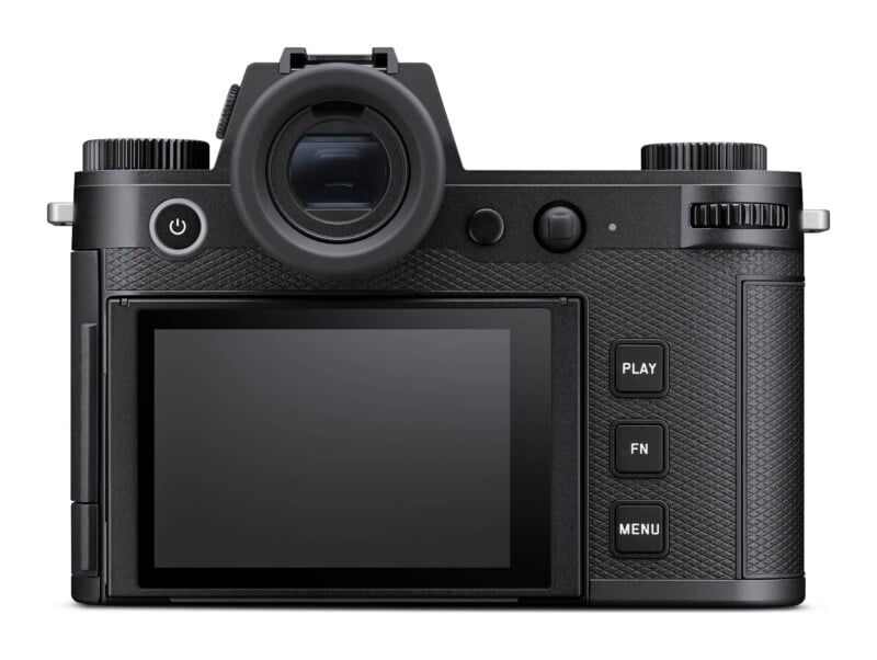 The back view of a black digital camera featuring a large LCD screen, an electronic viewfinder, and buttons labeled PLAY, FN, and MENU.