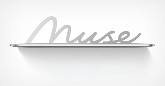 A silver-colored floating shelf against a white wall features the word "Muse" in a cursive, metallic script as its back support.
