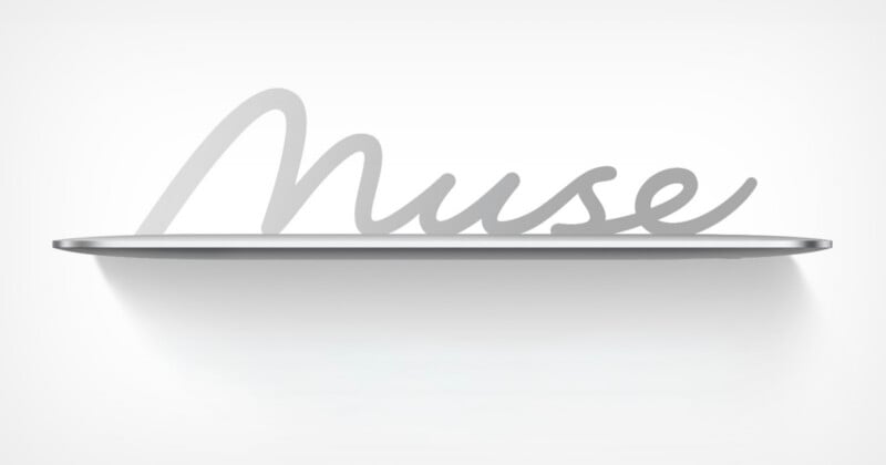 A silver-colored floating shelf against a white wall features the word "Muse" in a cursive, metallic script as its back support.