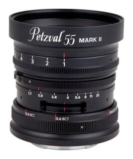A black Petzval 55 Mark II camera lens with visible aperture, focus, and bokeh control rings, shown against a white background.
