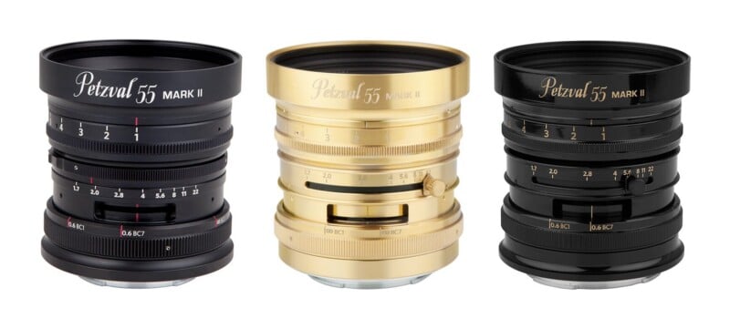 Three Petzval 55 Mark II camera lenses in matte black, brass, and glossy black finishes, shown side-by-side against a white background.