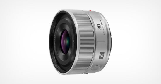 A silver Panasonic Lumix S-series 20mm f/2.5 prime lens viewed from a side angle against a white background.