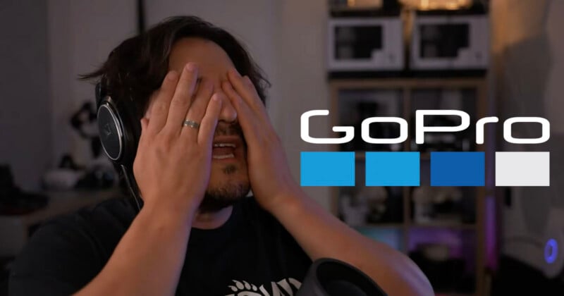 A man wearing headphones covers his face with his hands next to a large GoPro logo.