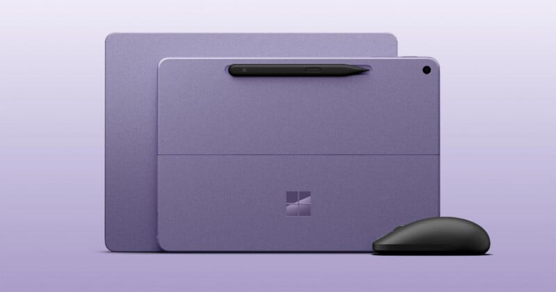 A purple tablet with a stylus attached to the back, a matching purple keyboard cover, and a black wireless mouse on a light purple background.